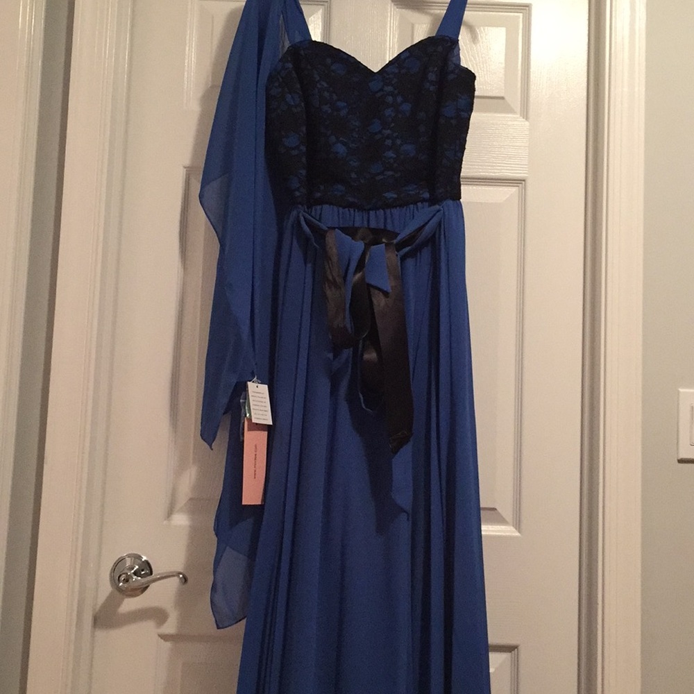 Evening gown/ length from shoulders down 61’ inch.